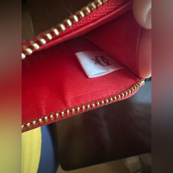 LIKE NEW MCM Red and Tan Allover Logo Printed Zipped Card Holder. - Picture 4 of 7
